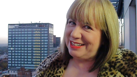 Hot brunette gets her ass drilled with a tall black dildo