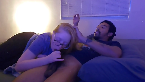 Amateur interracial video shows a white girl sucking a black cock