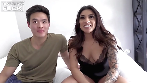 Blonde and brunette with tattoos fuck in a interracial video