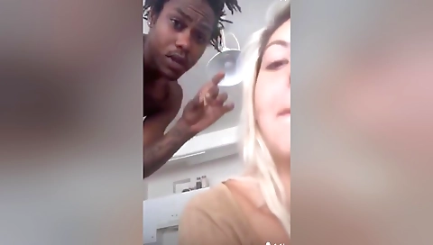 Blonde with tattooed pussy is fucked in tight shorts