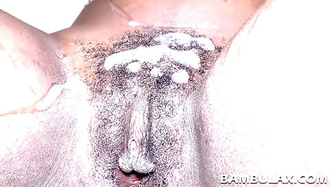 Ebony girl and her black boyfriend have fun on the beach