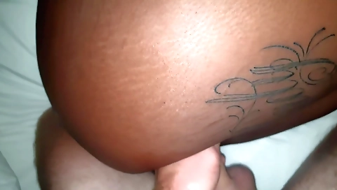 Ebony chick with big ass and huge tattoos showing off