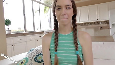 Bright-eyed brunette gamer and her friend in a funny scene