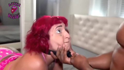 Redhead with a tattooed body fucked in an interracial threesome